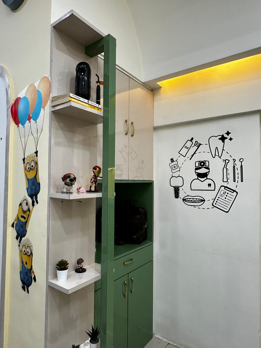Reception display shelving with a kid-friendly theme at Happy Tooth, Pune