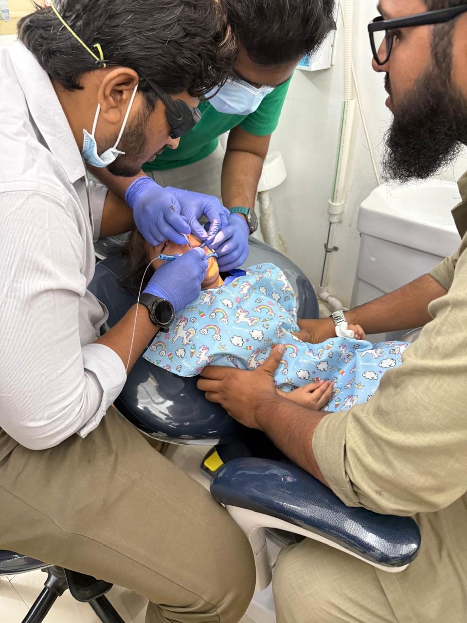 Laser tongue-tie (frenectomy) surgery for a child by Dr. Rajat Shaikh at Happy Tooth, Mohamadwadi, Pune
