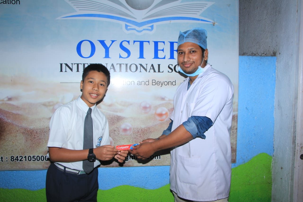 Happy Tooth dentist at a school oral-health programme presentation in Pune