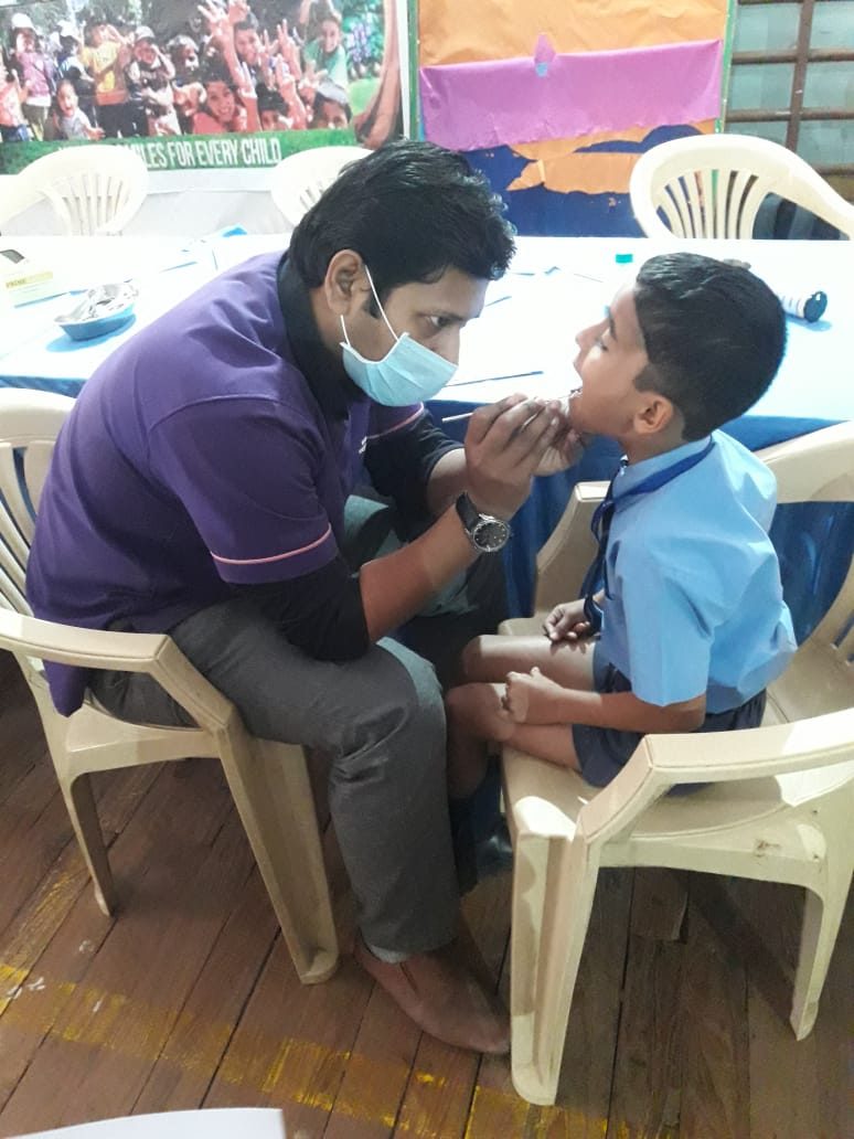 School dental check-up programme conducted by Happy Tooth dentists for children in Pune